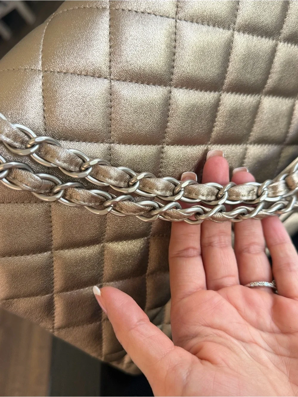 CHANEL Maxi Double Flap Bag in Metallic Gold Lambskin Leather